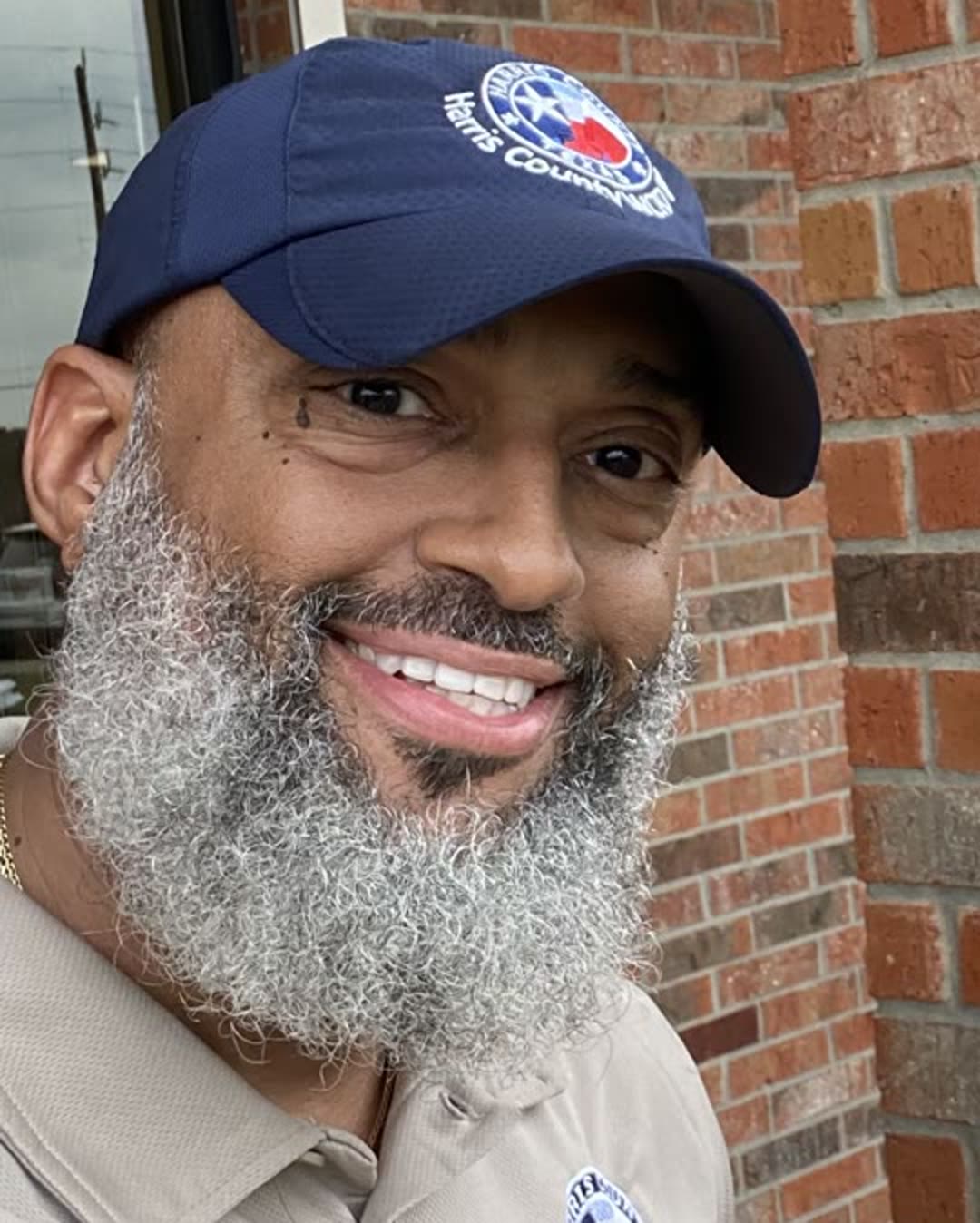 Tahir Charles in a Harris County WCID cap and District polo